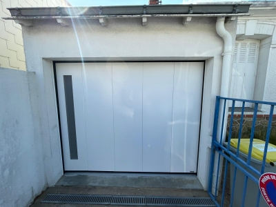 Installation d'une porte de garage à déplacement latéral motorisée à Nantes (44200)